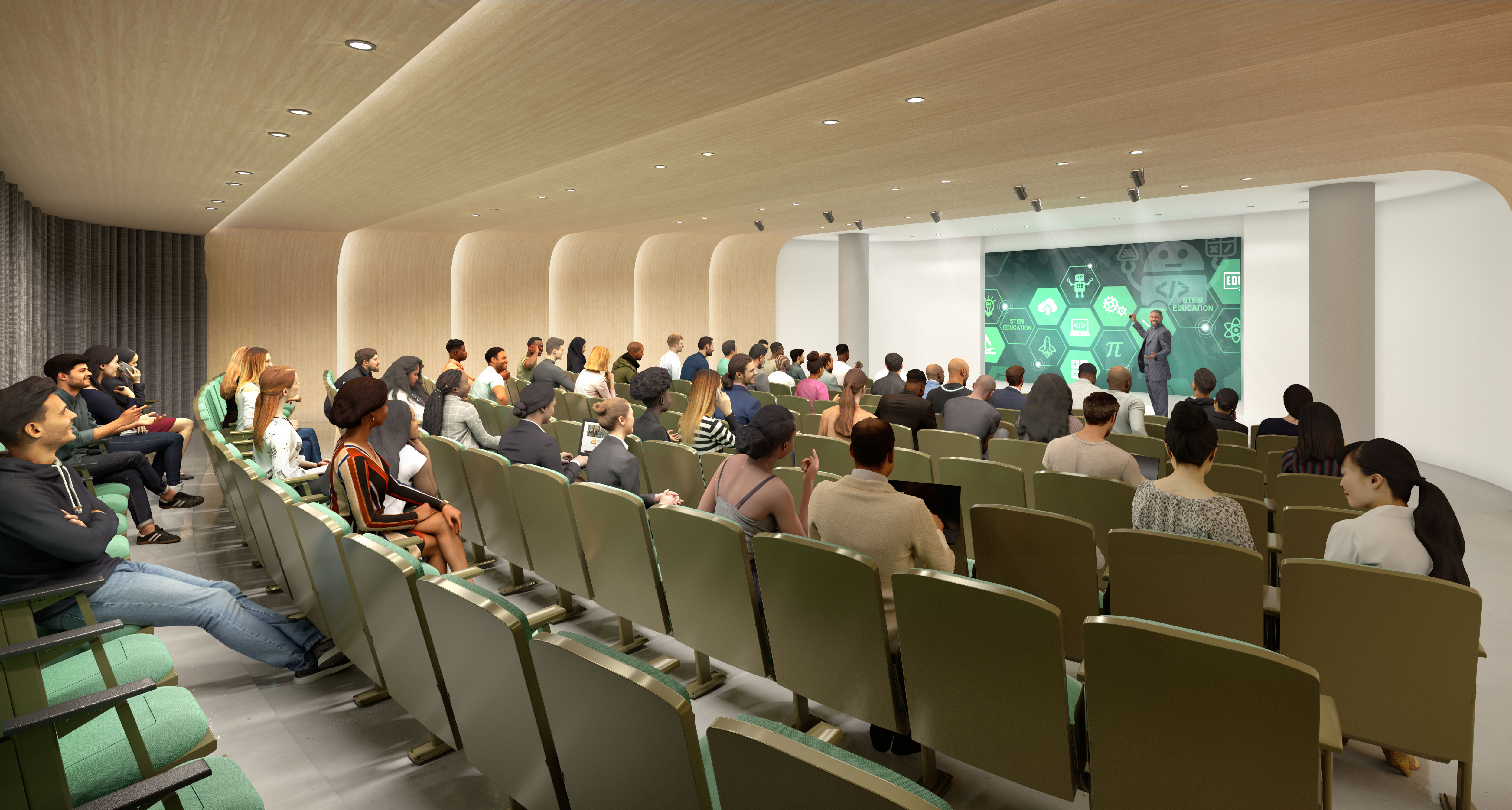 Lecture hall with an audience listening to a speaker in front of a green screen.
