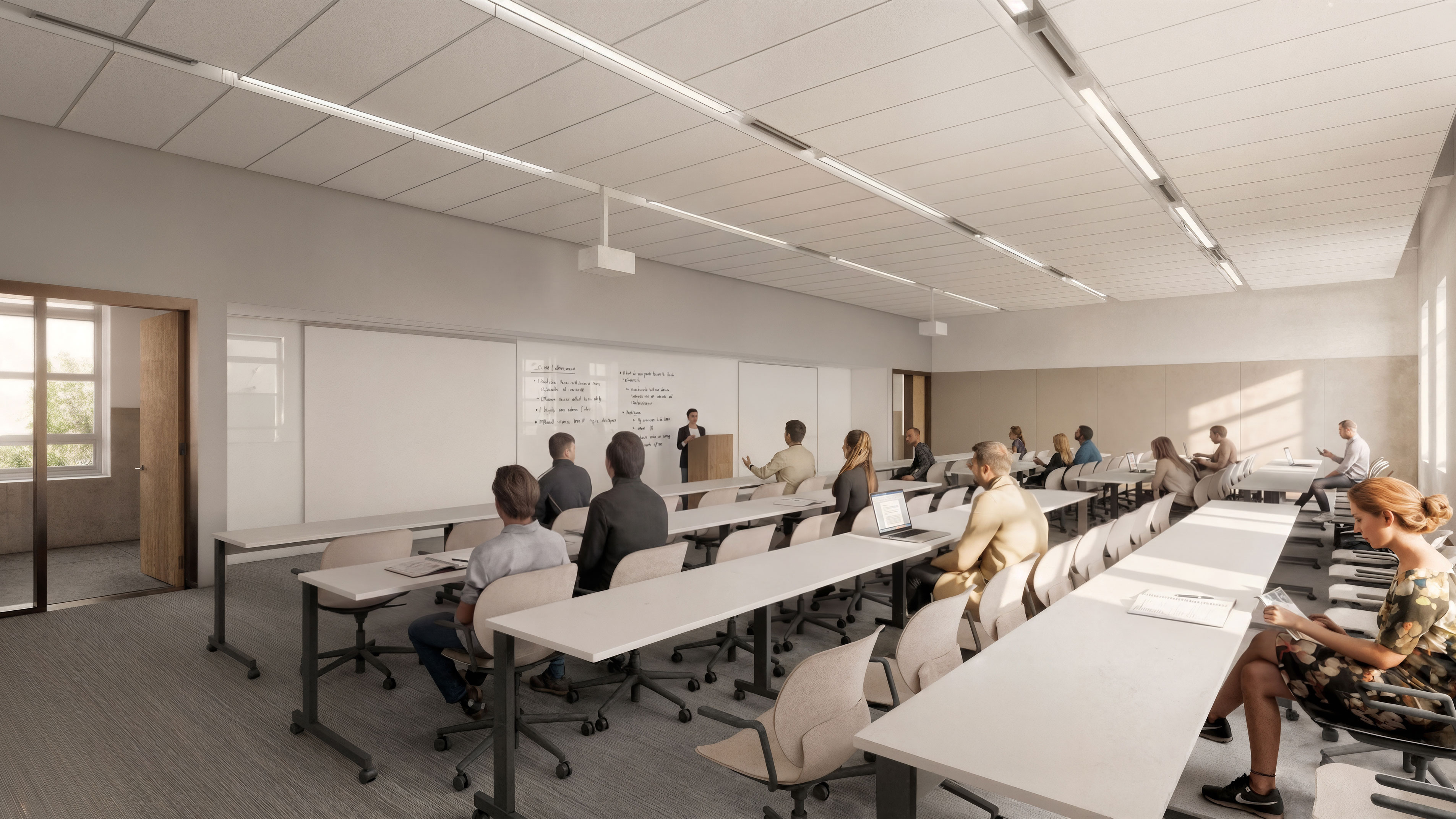 Students sit in a sunny, updated classroom at long tables.