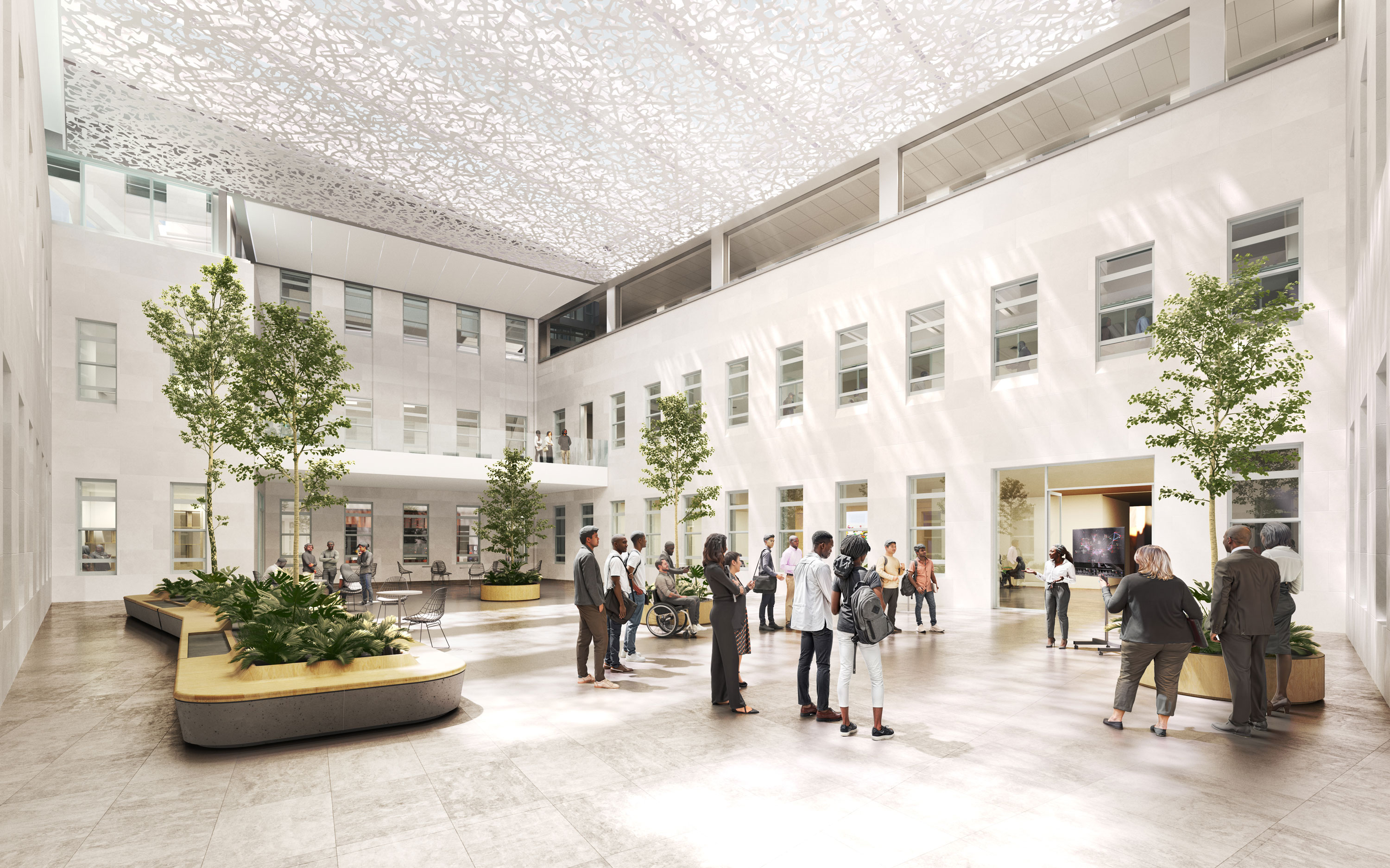 Spacious, bright indoor atrium with trees, white walls, and people gathering.